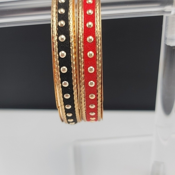 Set of gold tone red and black bracelets. GUC - Picture 3 of 8